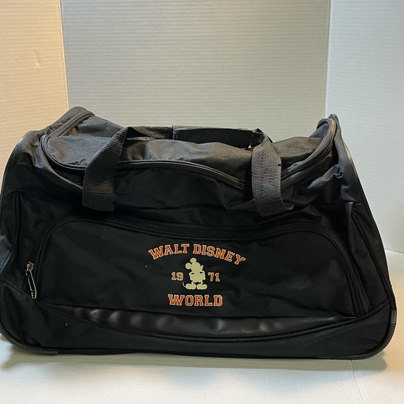 Disney Handbags - Vintage 1971 rolling Walt Disney World luggage